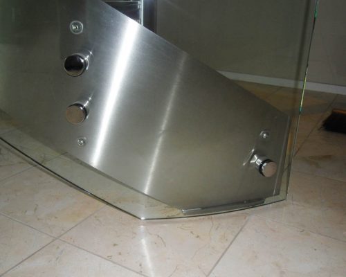 Stainless steel and glass spiral stair in residence 16
